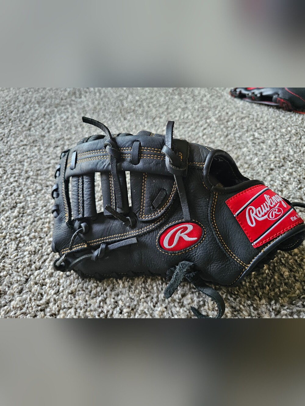 Rawlings Black Baseball Glove with Gold Script Accent